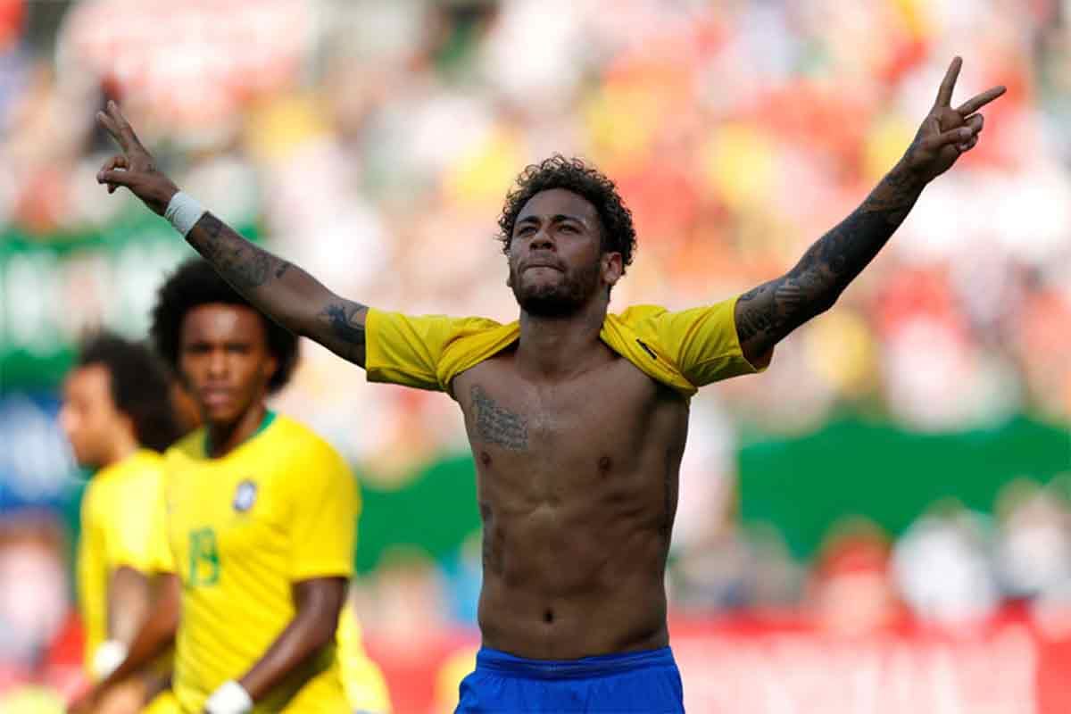 neymar goal helps brazil win over austria spain registers narrow win