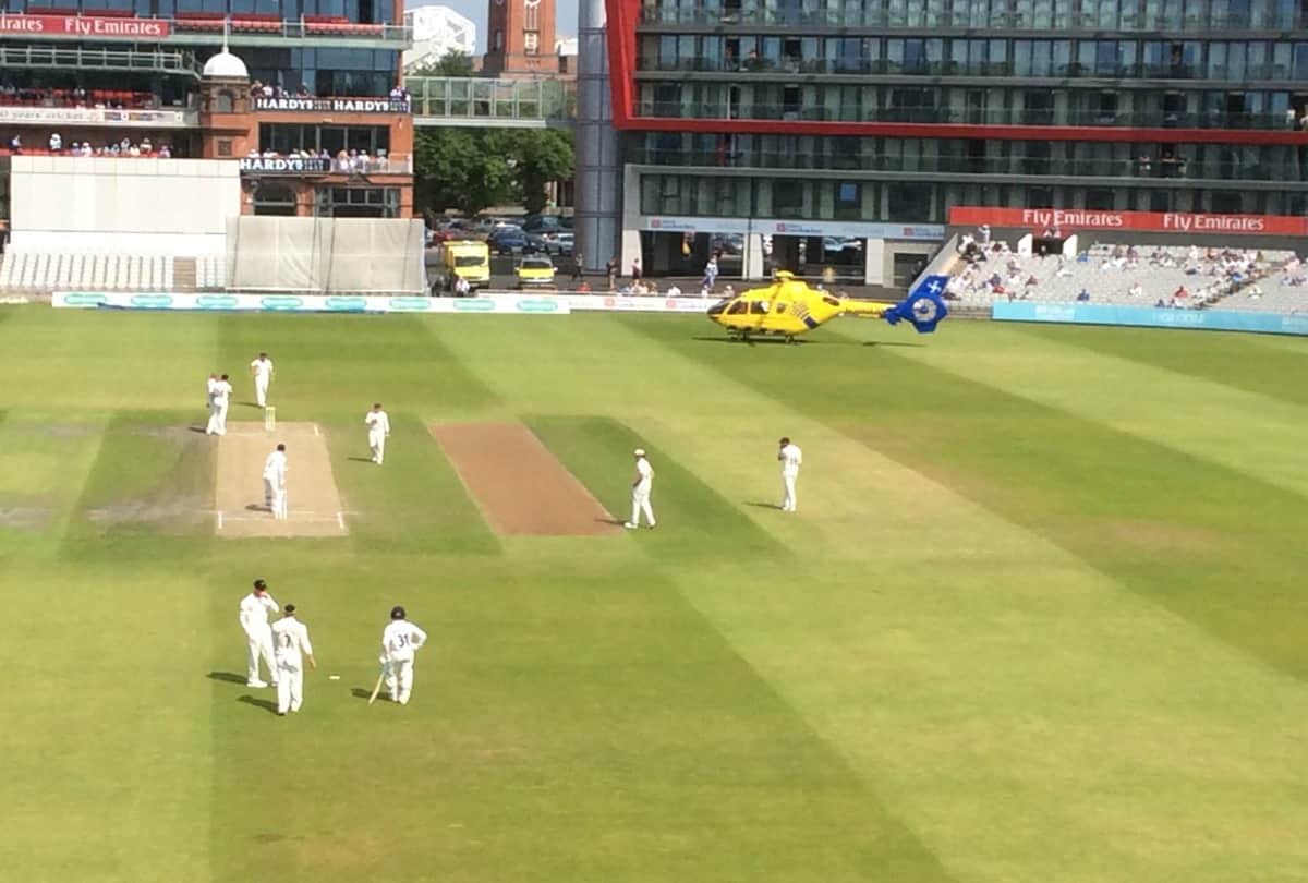 Air ambulance lands on outfield to help ill spectator during clash between Lancashire and Essex