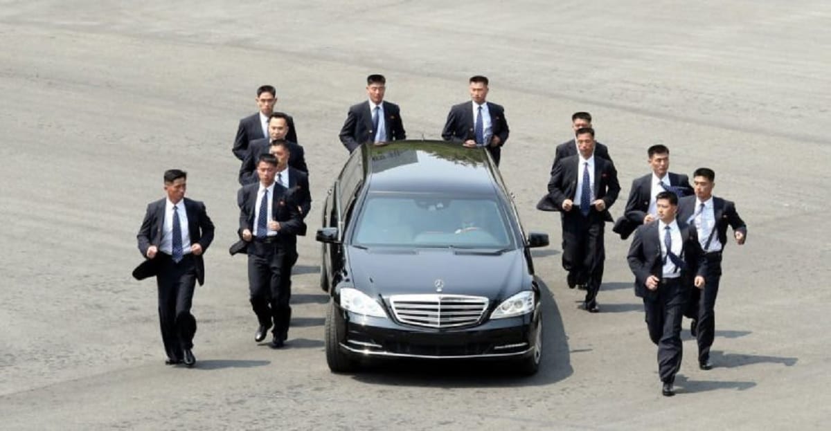Security of North korean leader Kim Jong un, bodyguards run around his car