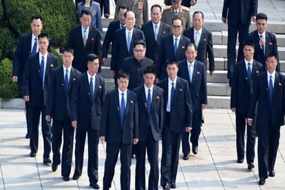 Security of North korean leader Kim Jong un, bodyguards run around his car