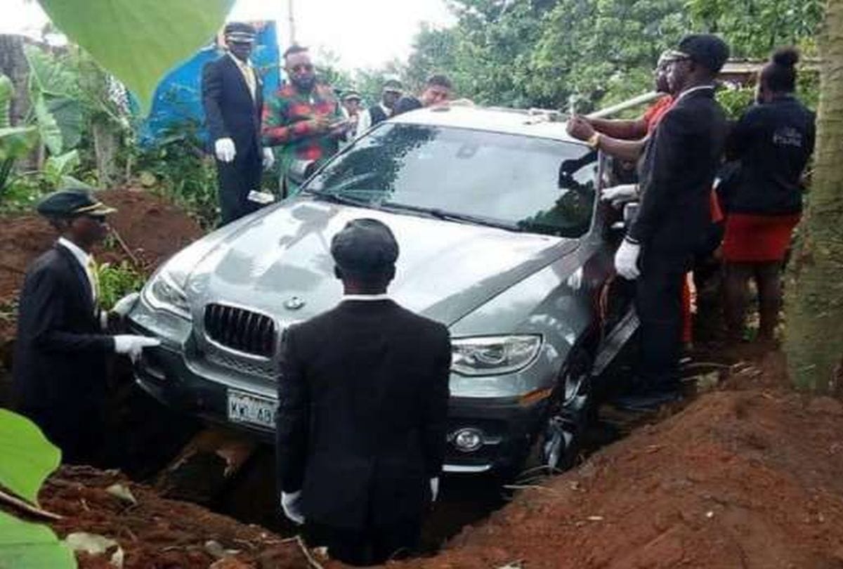 Man buries his father in new BMW car to give Honour him 