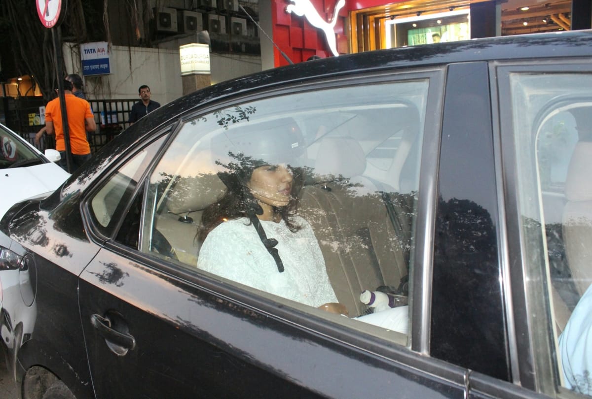 Rhea Chakraborty wear Helmet in car in Mumbai
