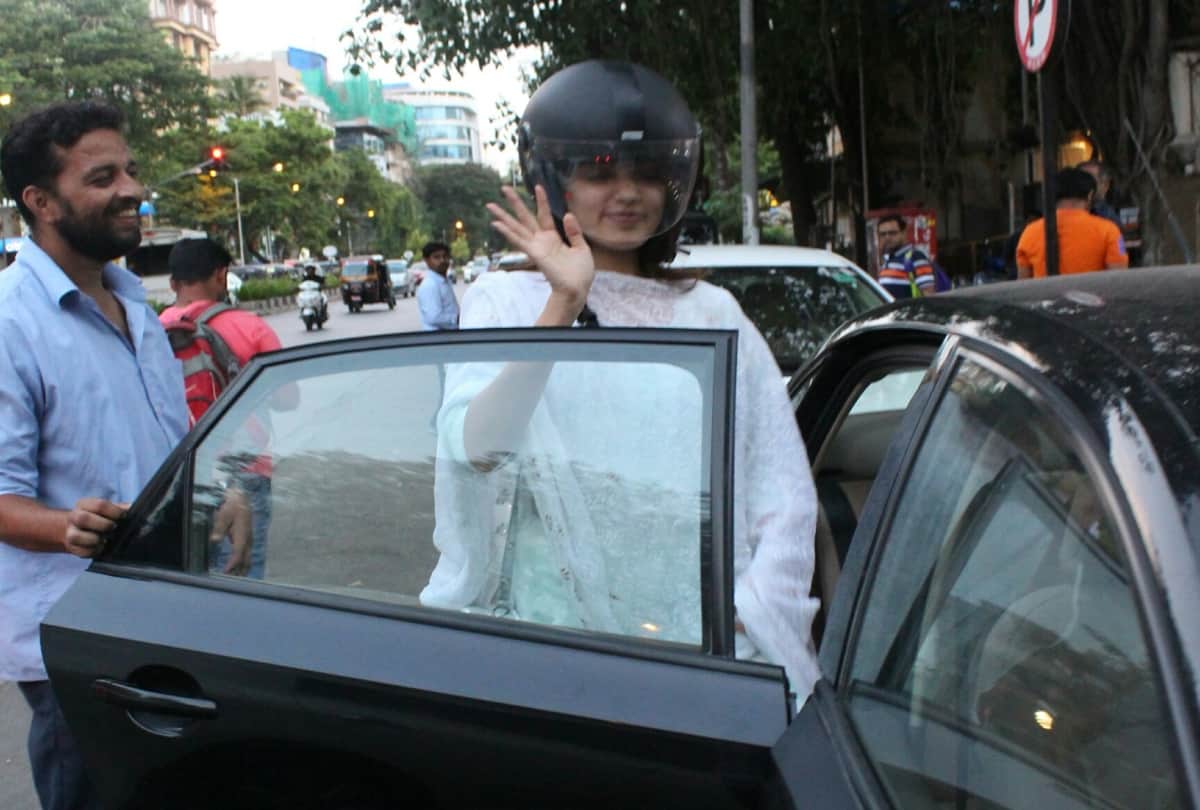 Rhea Chakraborty wear Helmet in car in Mumbai