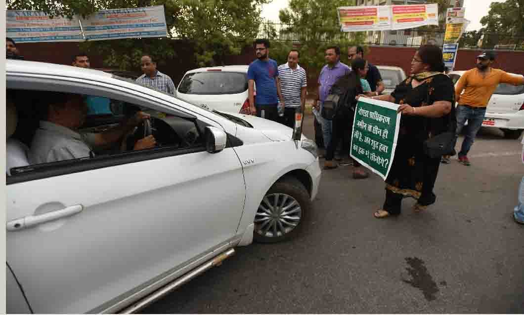  Protest against Dumping Ground by  riding  of the donkey by wearing mask of minister and CEO 