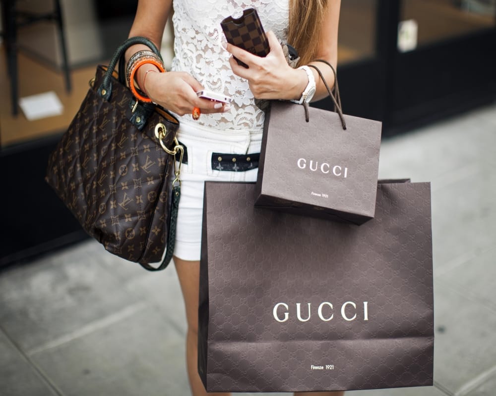 gucci brand launch orange checkered dress for men attached with ribbon bow in waist