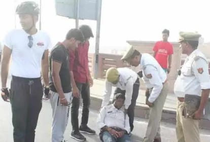 constable hit by bike during helmet checking campaign