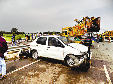 Uncontrolled truck, helper dies in crane