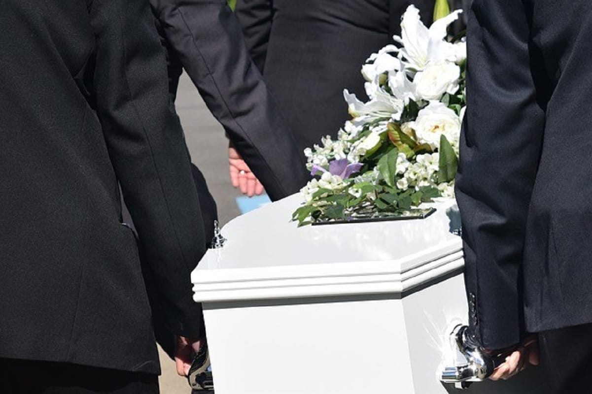 son preparing for mothers funeral coffin falls on him in freak accident