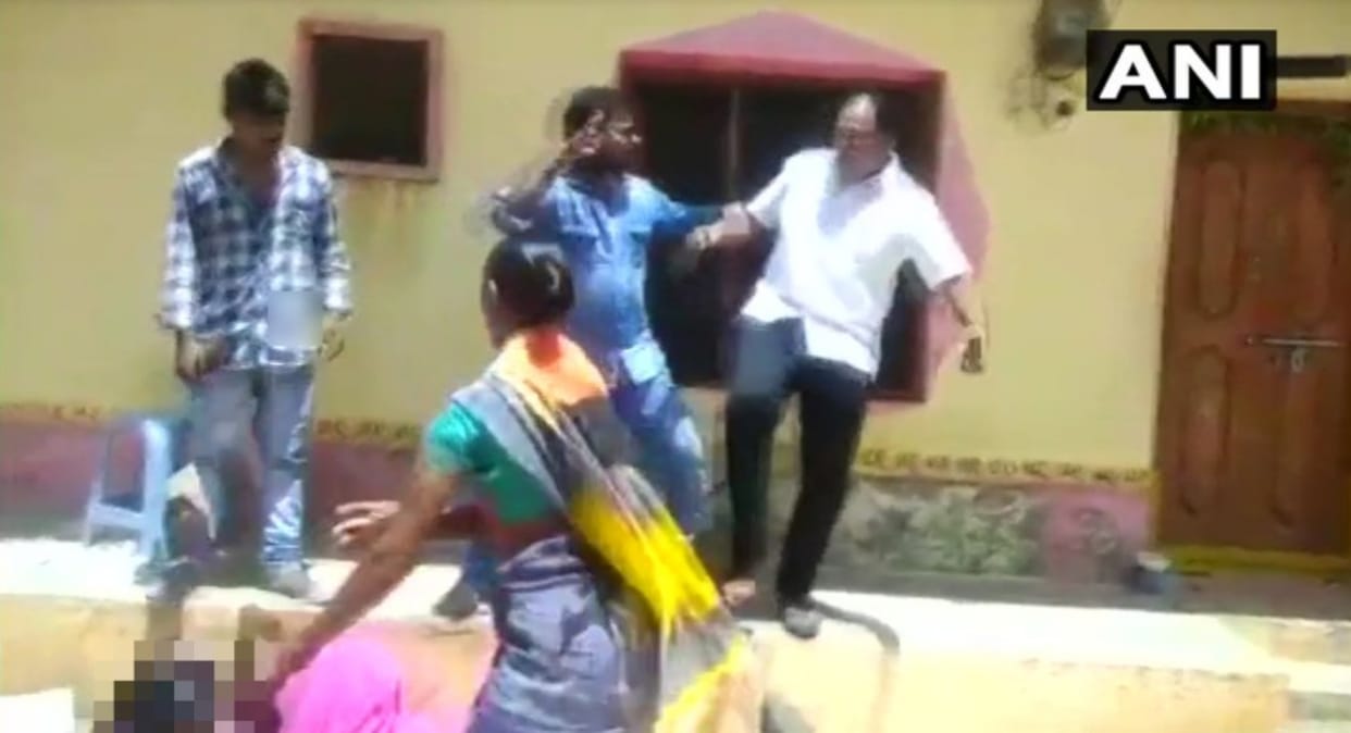 TRS public representative Immadi Gopi kicked a woman in Indalwai village 