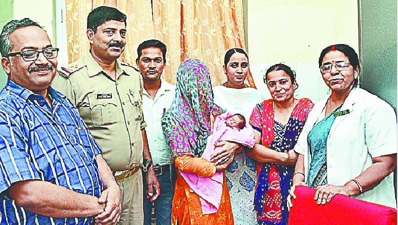 Nanny child handed to mother