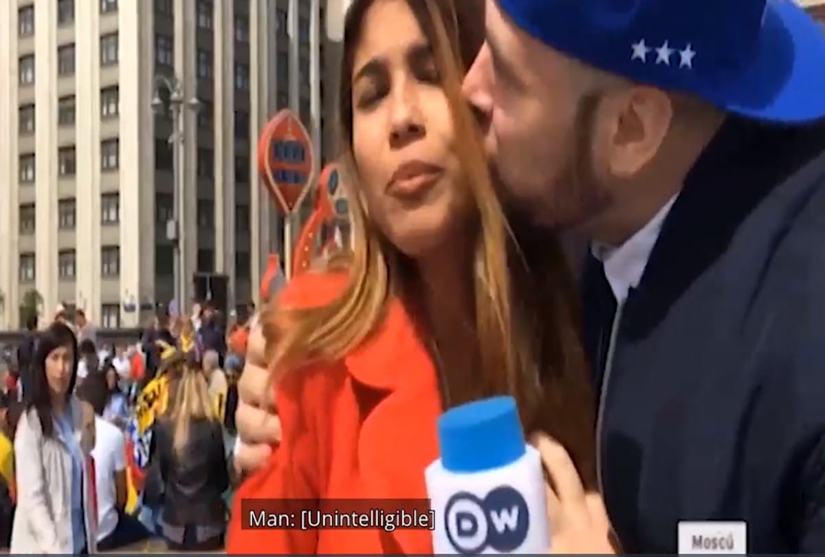 Over Excited fan kissed tv reporter when she was live on tv during FIFA World cup 2018