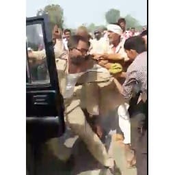 police's jipsy strike on woman