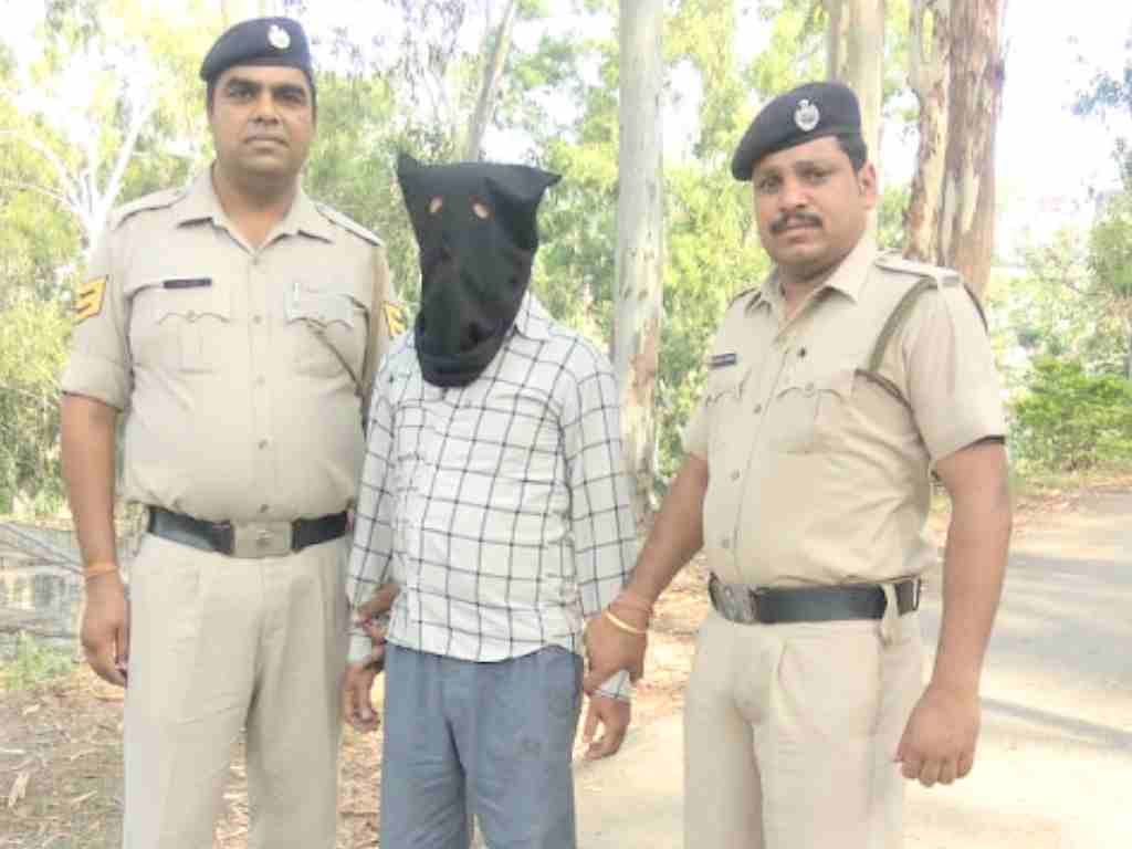 Police arrested a criminal, he was wanted list in gangster.