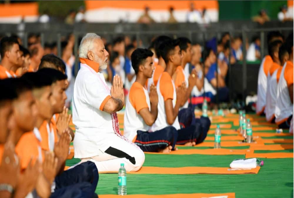 PM Narendra modi yoga posture photos from dehradun fri