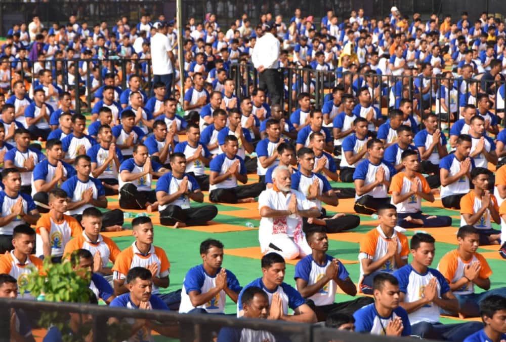 PM Narendra modi yoga posture photos from dehradun fri