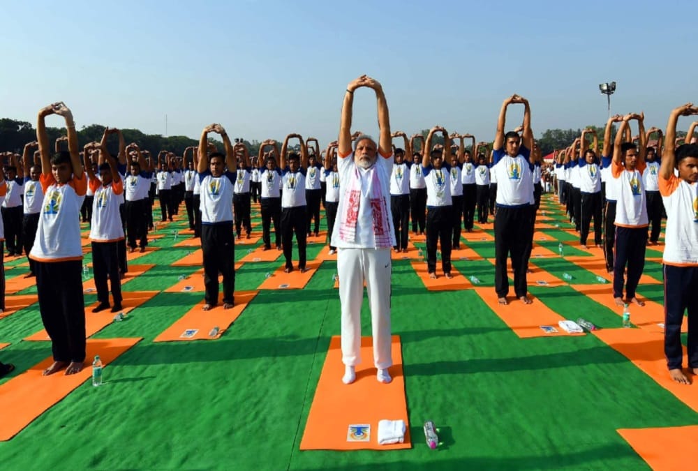 PM Narendra modi yoga posture photos from dehradun fri