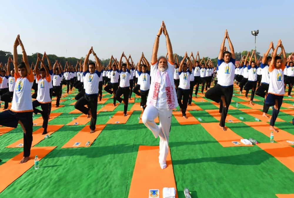 PM Narendra modi yoga posture photos from dehradun fri