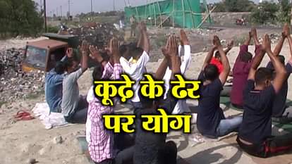 people perform yoga at a trenching ground in haldwani on international yoga day 