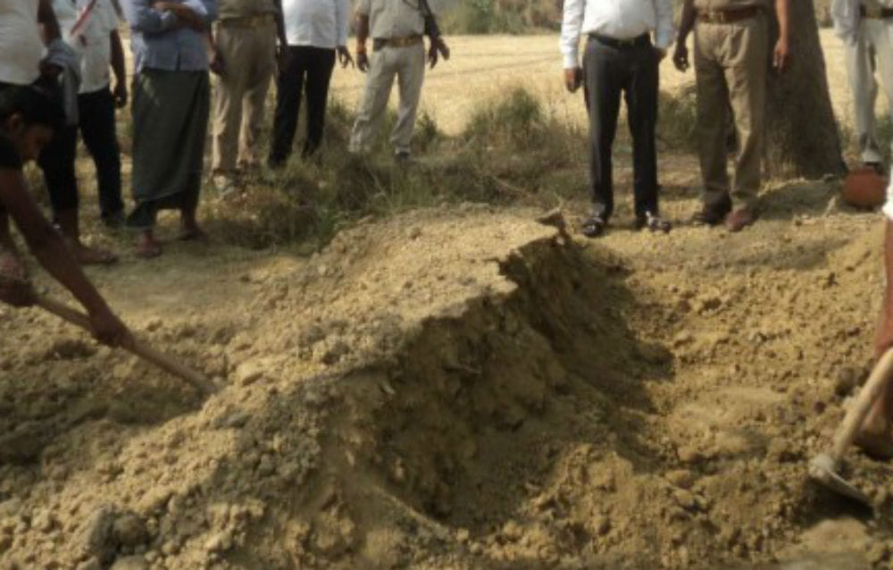 teenage body removed from grave after one month