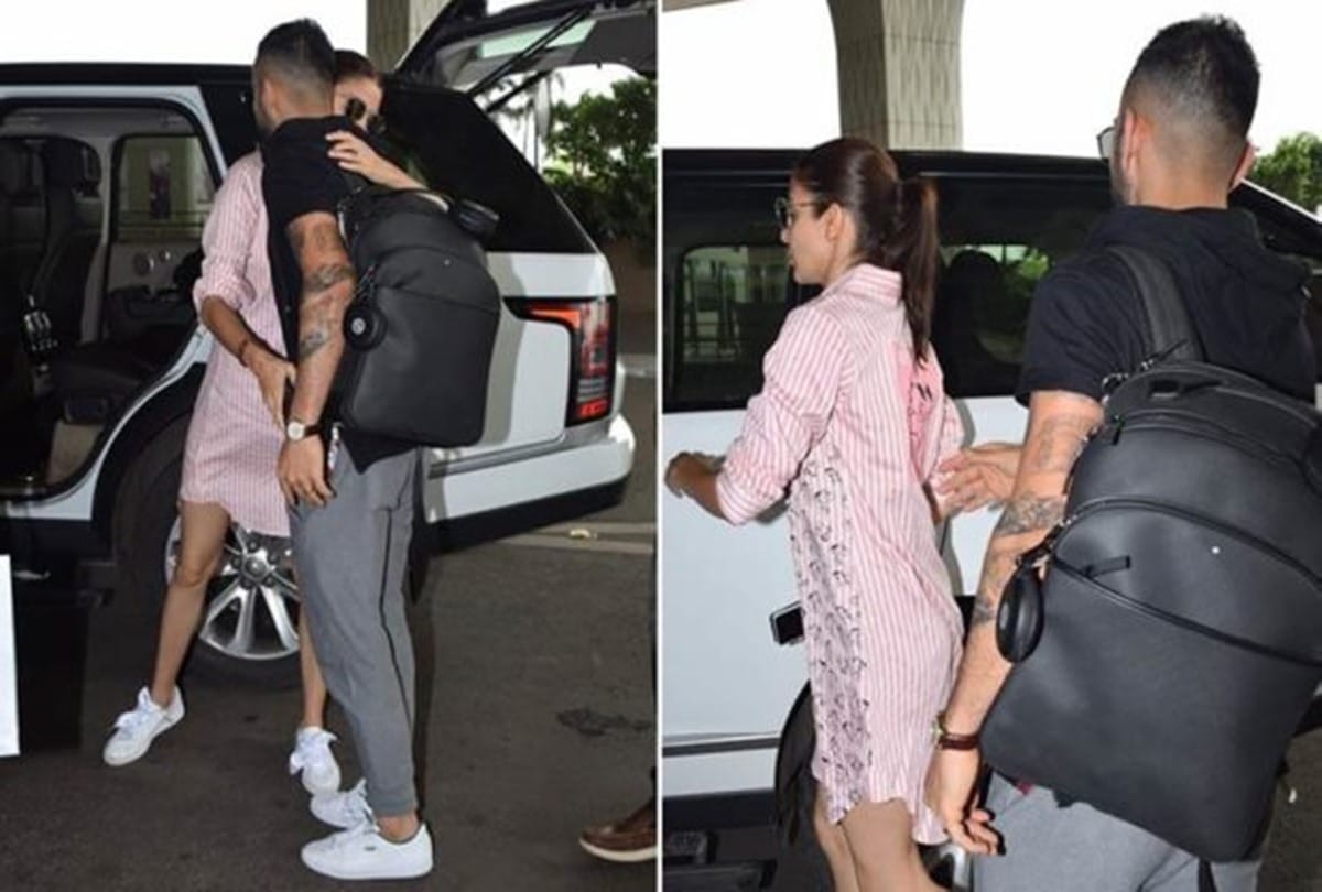 Anushka Sharma hugs husband Virat Kohli and say good bye before england tour at airport