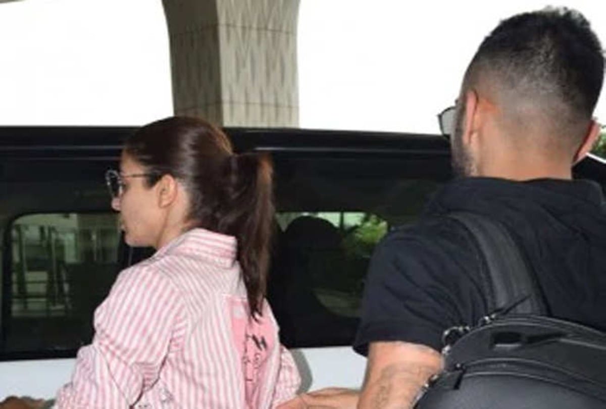 Anushka Sharma hugs husband Virat Kohli and say good bye before england tour at airport
