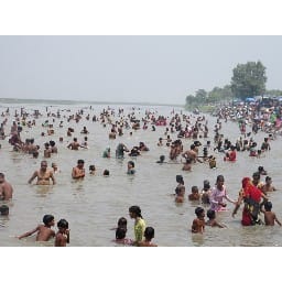 people bathing in ganga on dashera