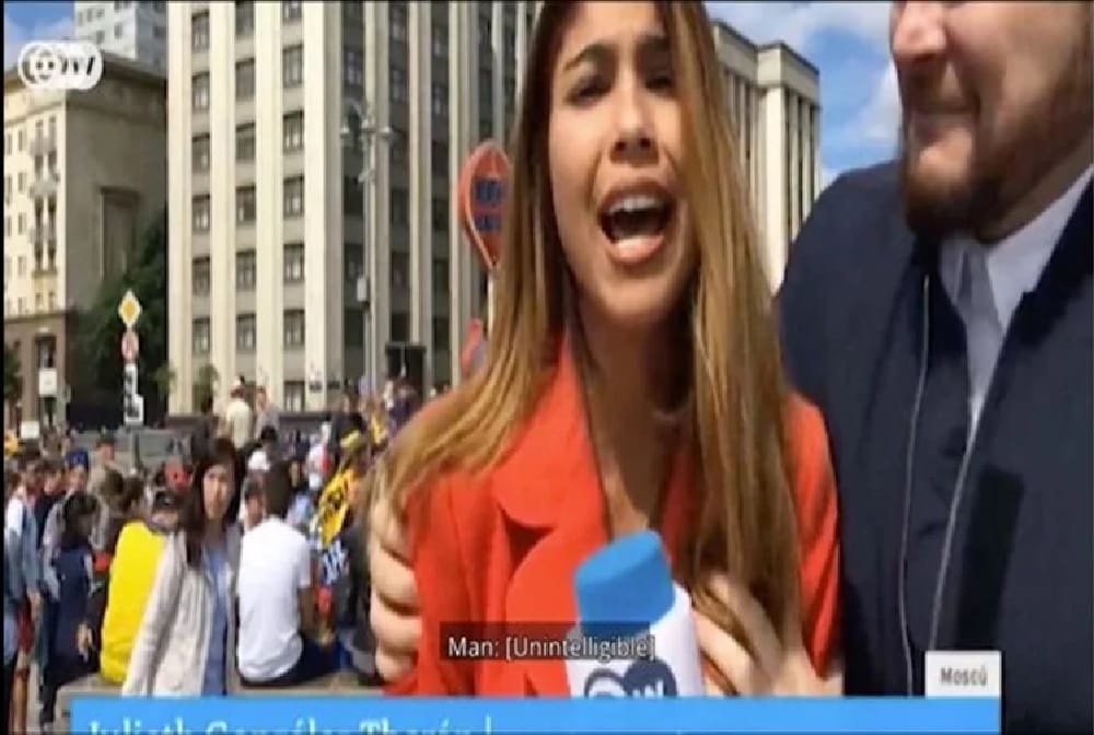 russian man who apologises after kissed female reporter live on tv during fifa world cup 2018