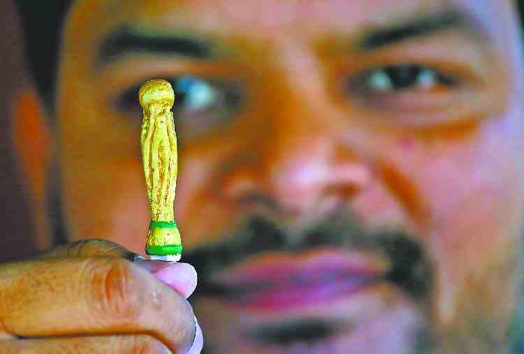 fifa world cup 2018 trophy Engraved on chalk by artist balraj singh