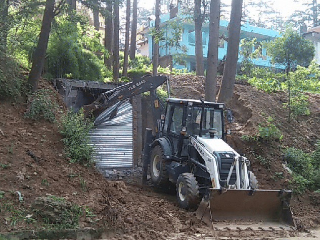 Administration encroached with demolition from JCB