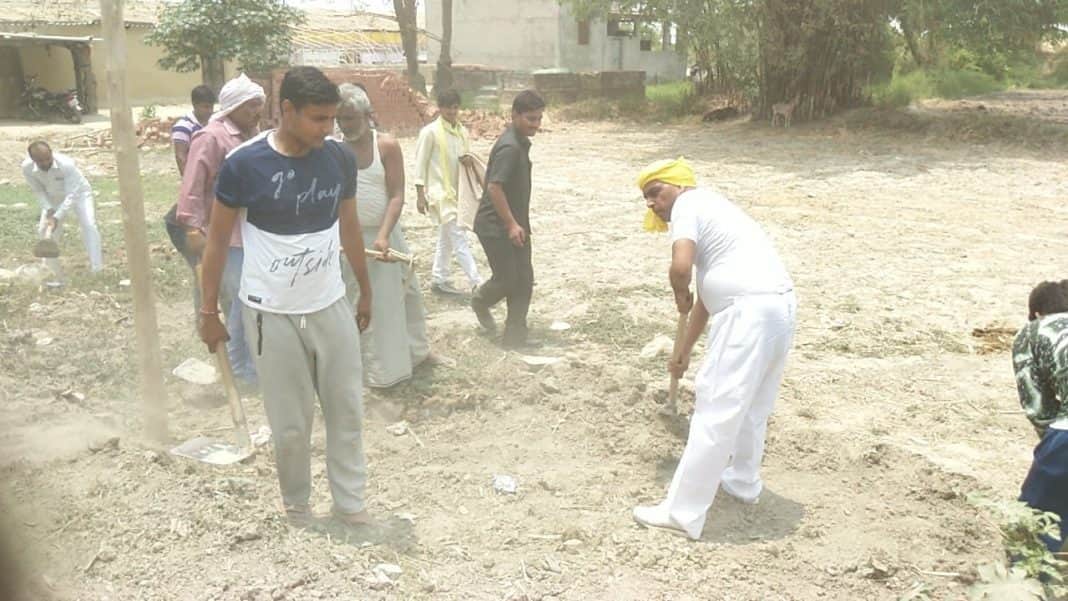 om prakash rajbhar come out for road construction with spade in his village