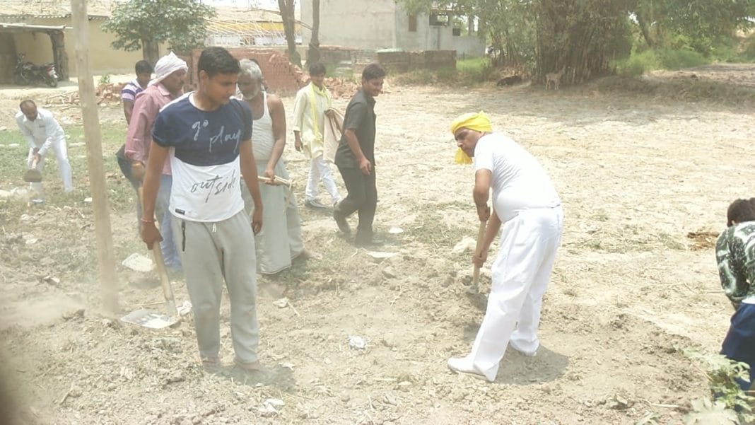 om prakash rajbhar come out for road construction with spade in his village
