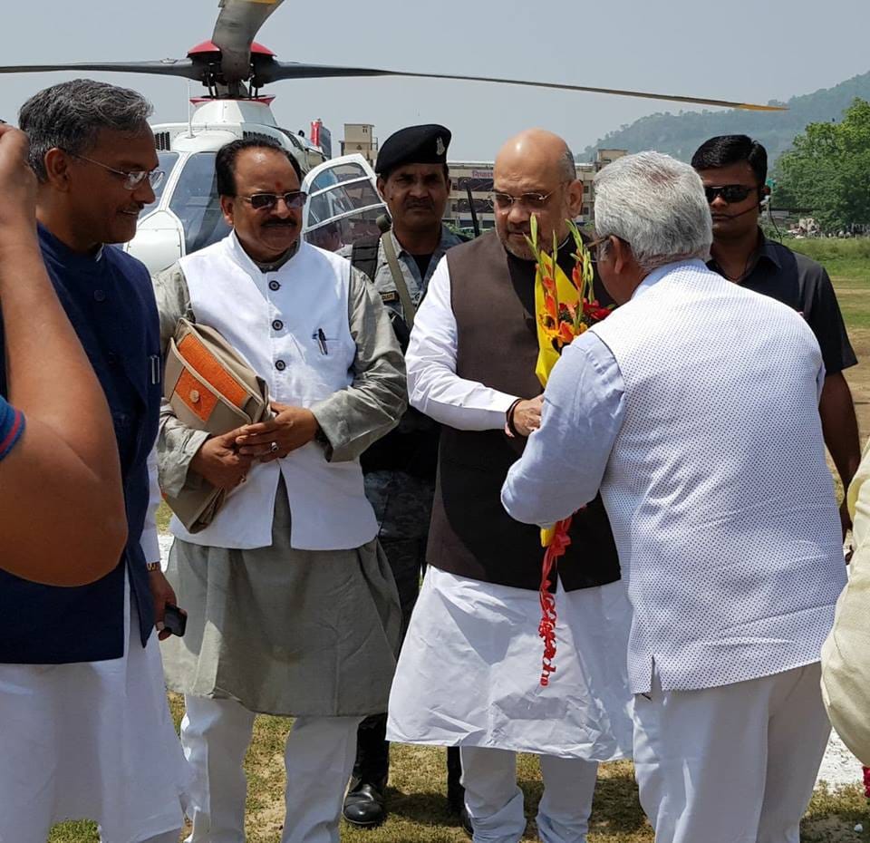 Bjp leader praised congress harish rawat in front of amit shah