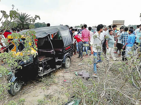 Auto-van collide, one killed, 12 wounded