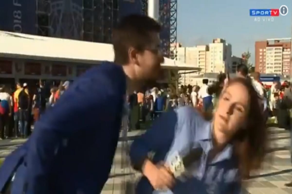 football fan try to kiss female reporter during fifa world cup 2018