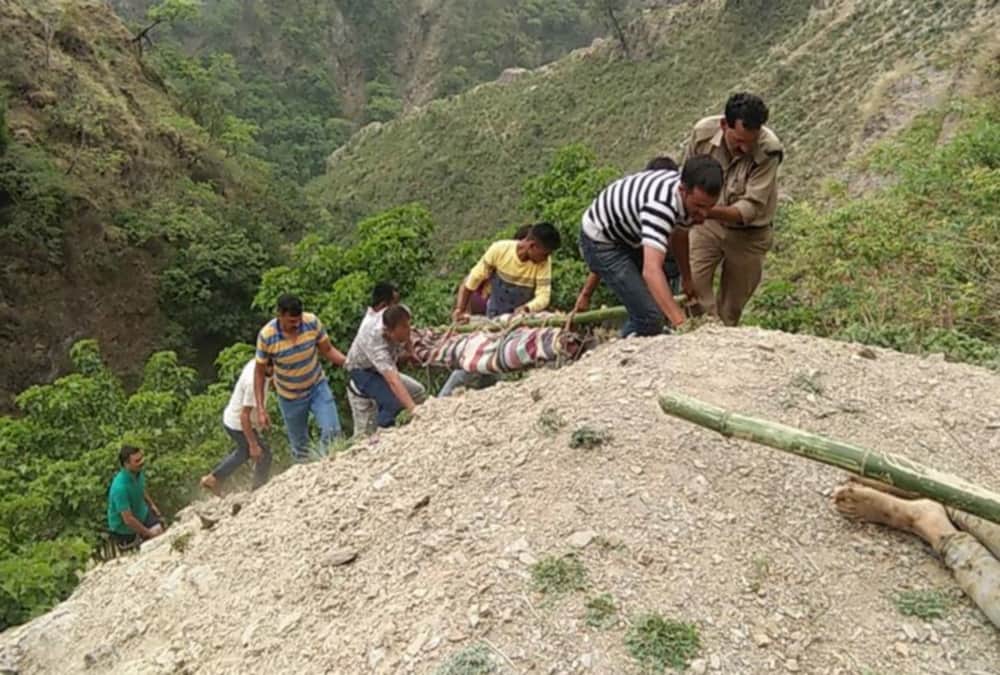 Dead boy rescue photos after Tractor trolley Accident in chakrata 