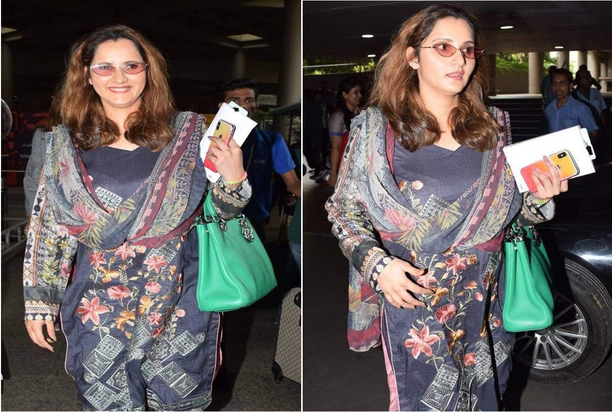Sania Mirza flaunt her baby bumps as they get clicked at the airport