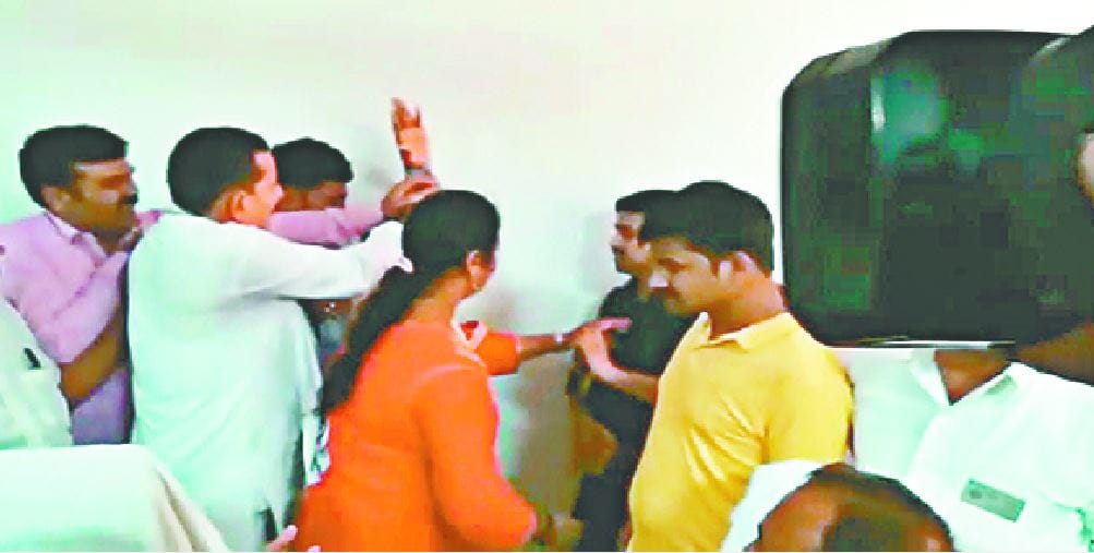 Beating the employee in front of the mayor and the city commissioner