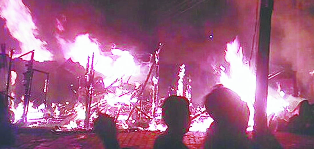 Fire in the wooden market, father son scorched