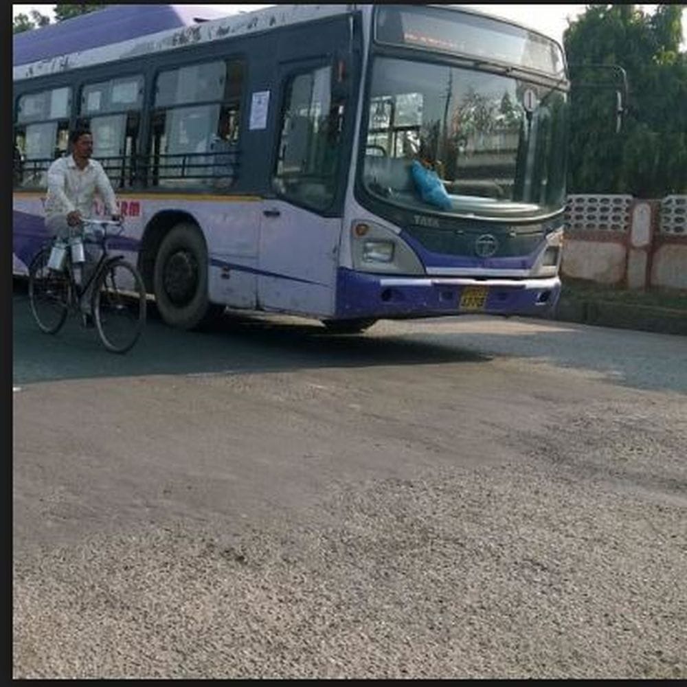 between female and conductor scramble at the bus 