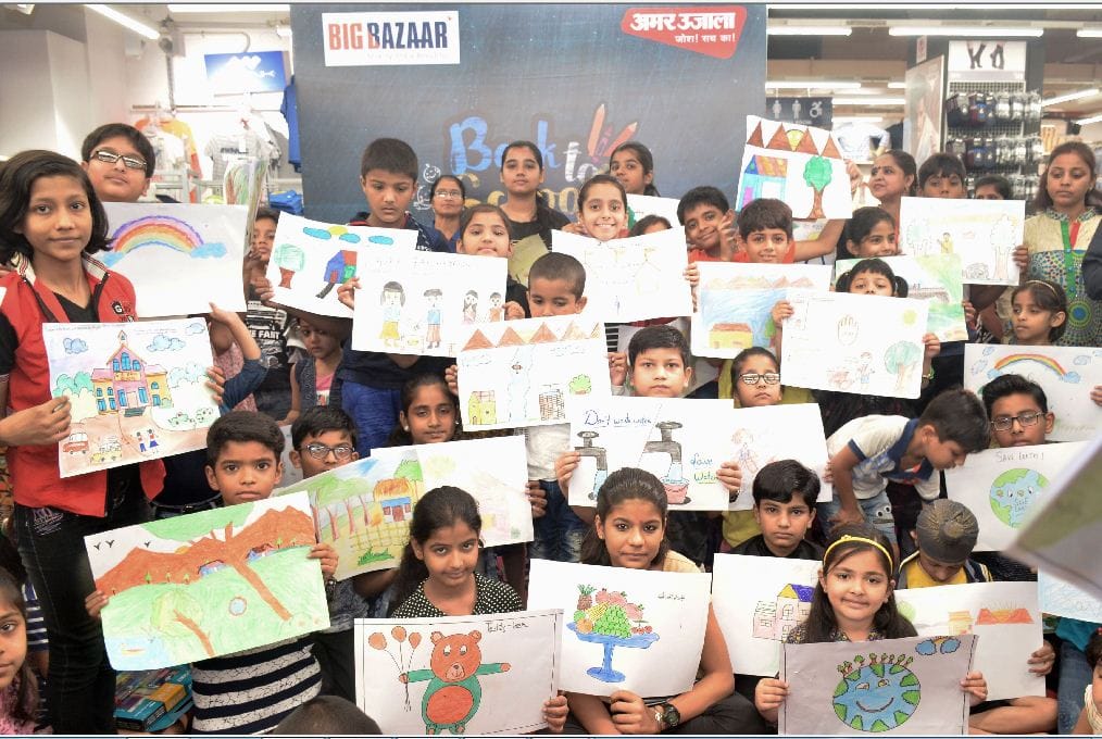 schools children participate drawing compaction help by Amar Ujala, Big Bazaar 