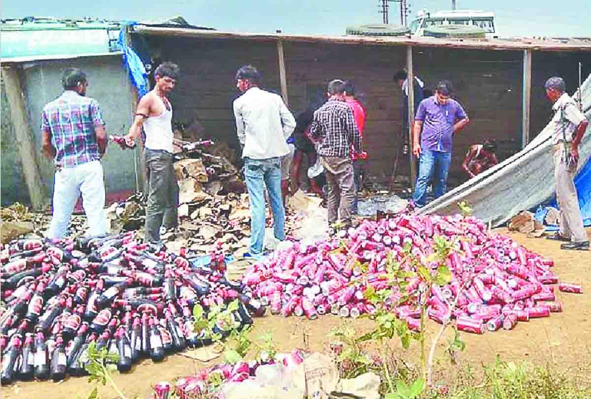 Villagers engaged in robbing beer trucks bottles and cans looting