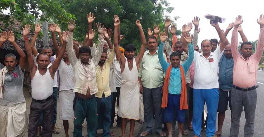 people protested for flood rescew work