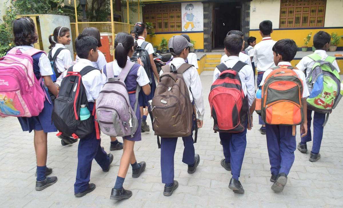 School open after summer vacation and children have fun in first day 