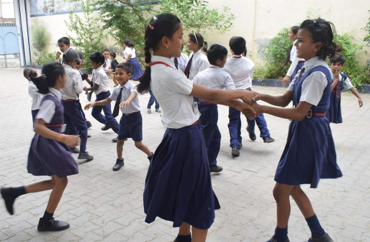 School open after summer vacation and children have fun in first day 
