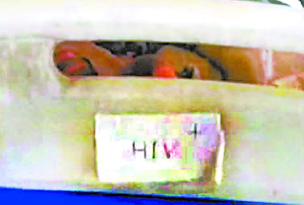 hospital staff put hiv posotive slip on patient's bed created ruckus
