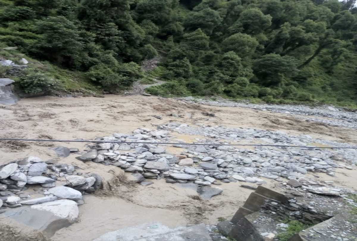wood bridge swept away in flash flood in tissa chamba himachal