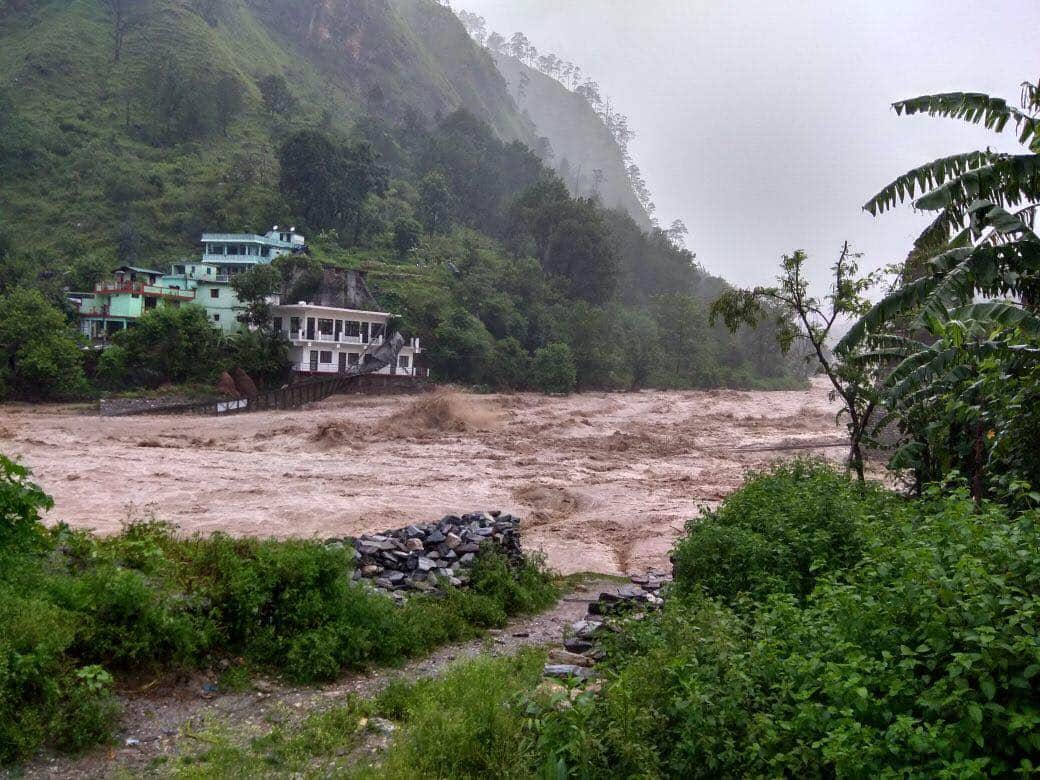 uttarakhand weather update bridge flows in flood and dehradun many people death due to rain