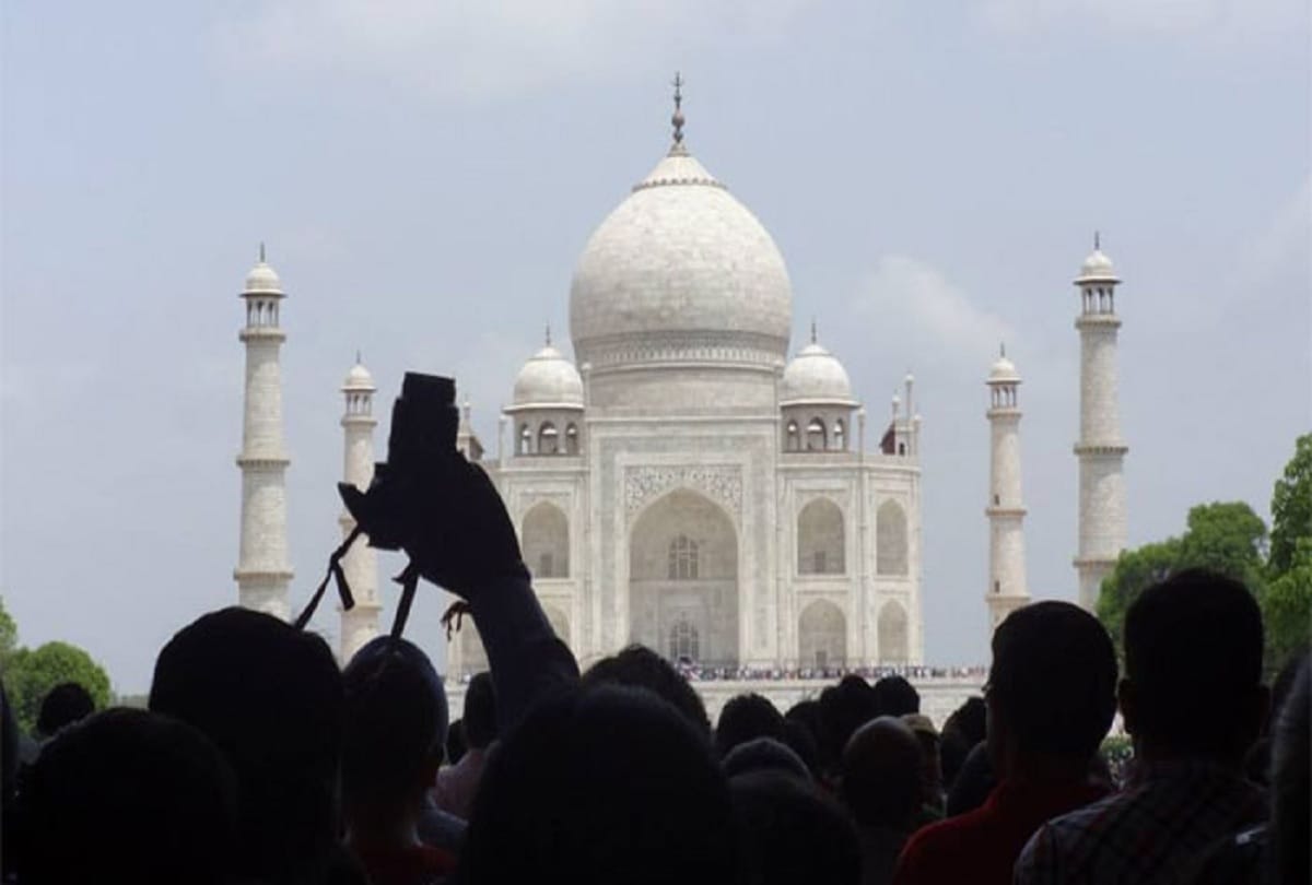 israel tourist fly drone camera near taj mahal