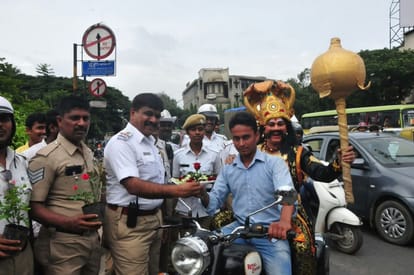 the God of death Yamraj on Bengaluru roads to teach bike riders way helmet is important 