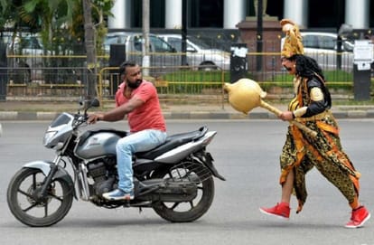 the God of death Yamraj on Bengaluru roads to teach bike riders way helmet is important 
